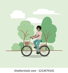 young man in bicycle on park