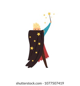 Young man in black mantle with stars. Cartoon magician with magic wand in hand. Flat vector design