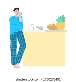 The young man in blue home clothes standing with a glass of water in the kitchen. Vector illustration in cartoon style.