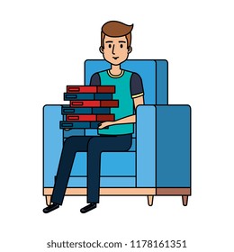 young man with books at the sofa