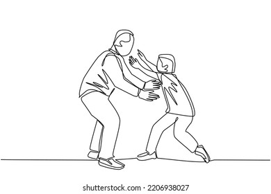 A young man and a boy run face to face while preparing to hug. father and son let go after long time no see. the happiness of a family, can reunite,hug and kiss. a warm hug that is a sign of happiness