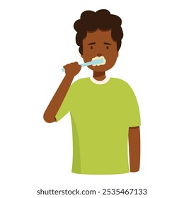 Un joven se cepilla los dientes con un cepillo de dientes y pasta de dientes, promoviendo buenas prácticas de higiene oral