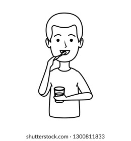 young man brushing teeth