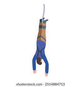 Young man bungee jumping upside down wearing protective gear