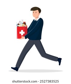 Young man carrying first aid kit in his hands. Health care concept. Prevention of viral diseases.