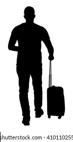 Young man carrying his rolling suitcase vector silhouette illustration isolated on white background. Passenger go to travel. Traveler with bag waiting taxi. Handsome boy with luggage on border.