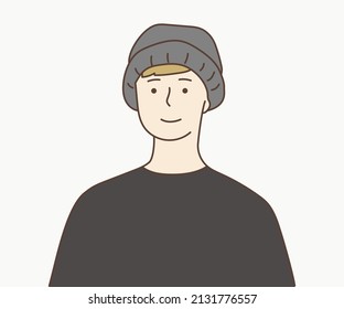 Young man cartoon character wearing beanie smiling portrait. Hand drawn style vector illustrations. 