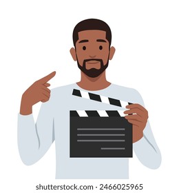 Young man character holding a clapper board, video industry. Flat vector illustration isolated on white background