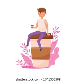 Young Man Character Sitting on Top of Huge Coffee Cup with Floral Backdrop Vector Illustration