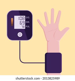 A young man is checking his blood pressure to see if he has any abnormalities.