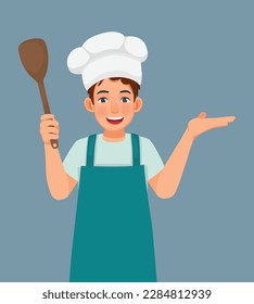 Young man in chef hat with apron holding ladle showing hand for copy space