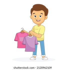 Young man chooses clothes on hanger on shopping