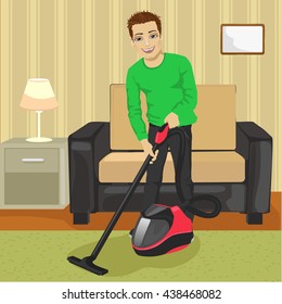 Young man cleaning carpet with vacuum cleaner at home