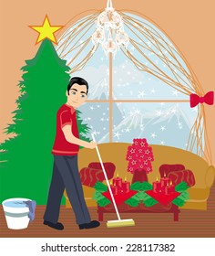 young man cleaning house before Christmas