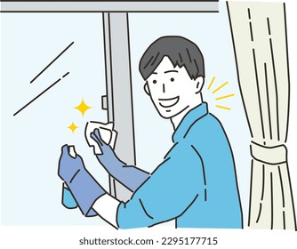 Young man cleaning the windows in the room
