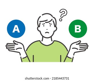 A young man comparing A and B. He looks troubled with choices.