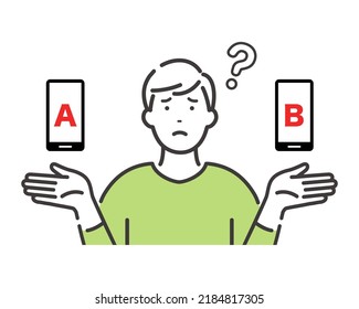 Young man comparing smartphones. An expression troubled by a choice.