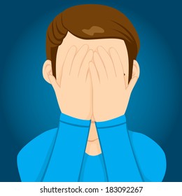 Young man covering face with hands hiding facial expression