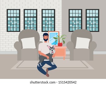 young man with cute dog mascot in the livingroom