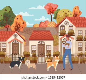 young man with cute dogs mascots in the autumn city scene