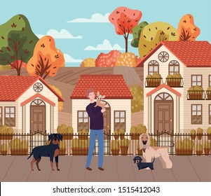 young man with cute dogs mascots in the autumn city scene