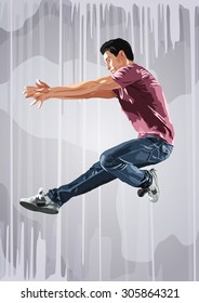 Young man dancer jumping. On wall background.