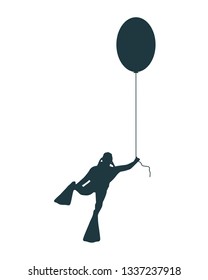 The young man in diver suit flying with toy balloon