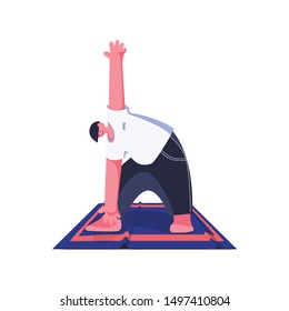 A young man does yoga on a yoga mat on a white background. 