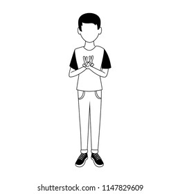 Young man doing peace hand sign in black and white