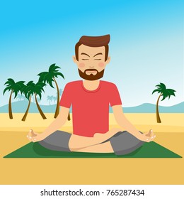 Young man doing yoga on a mat at tropical beach