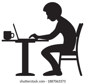 A young man is drinking coffee and using his laptop computer in silhouette