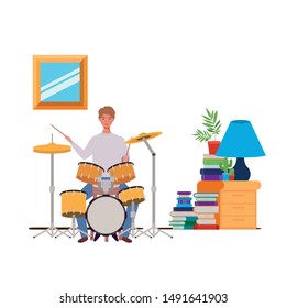 young man with drum kit in living room