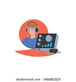 young man with earphones and audio console