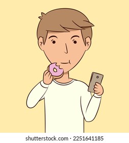 Young man eating donut watching smartphone