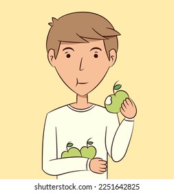 Young man eating green apple