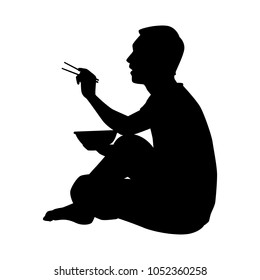 Young man is eating noodle silhouette vector