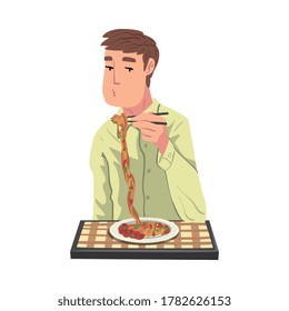 Young Man Eating Pasta, Cheerful Guy Sitting at Table with Checkered Tablecloth Enjoying Eating of Delicious Food Cartoon Vector Illustration