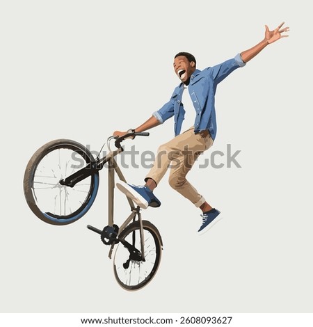  A young man excitedly jumping  on top  with bicycle.  just one wheeled up and back wheeled  touch in  road. watching lot of people standing on road.