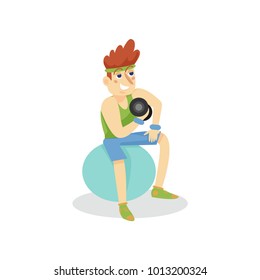 Young man exercising with dumbbells on a fitball, man working out in fitness club or gym, active healthy lifestyle cartoon vector Illustration