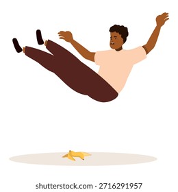 Young man falling after slipping on a banana peel, representing accidents, clumsiness, and unexpected falls
