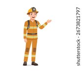Young Man in Firefighter Uniform Smiling and Gesturing to the Right Side in a Standing Pose