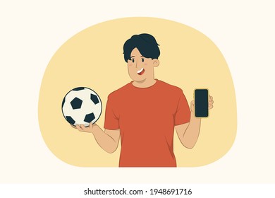 Young man football fan hold mobile phone with blank empty screen concept