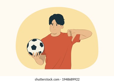 Young man football fan showing thumb down concept