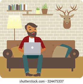 Young man freelancer working from cozy home