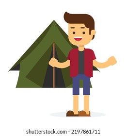 Young man in front a camping tent