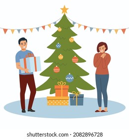  Young man giving gift box to woman near the Christmas tree. Vector flat style illustration