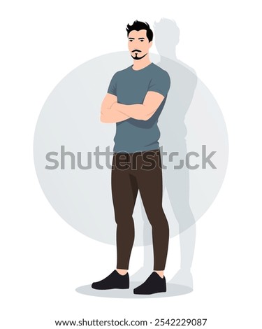 Young man in a gray-blue T-shirt and black trousers with a confident expression. Modern and minimalist style for everyday use.