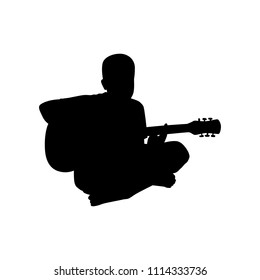 Young man with guitar silhouette vector