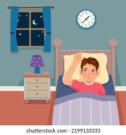young man has insomnia sleepless at night and stay awake on the bed