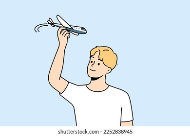 Young man have fun playing with airplane model. Smiling guy flying with plane miniature. Aviation and hobby. Vector illustration. 